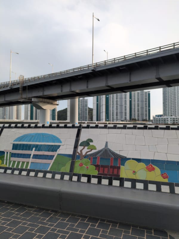 Witness documents routine Busan cityscape during morning walkabout