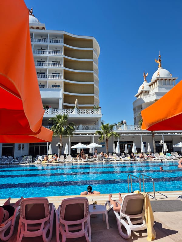 Resort guests enjoy typical poolside afternoon in Alanya, Turkey