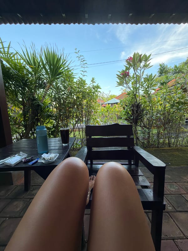 Person relaxes in garden setting in Kutuh, Indonesia