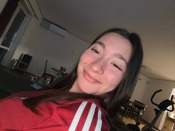 Young woman takes selfies during soccer match in Sofia