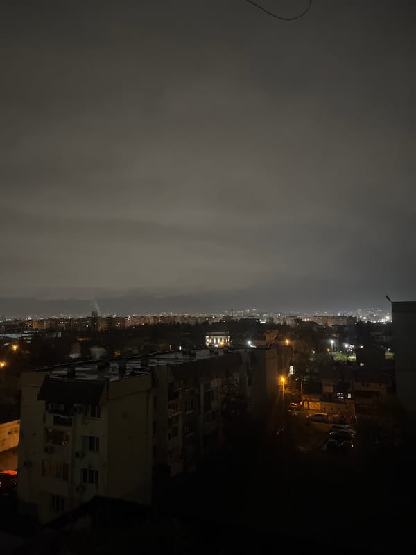Nighttime cityscape views captured across Sofia under overcast skies