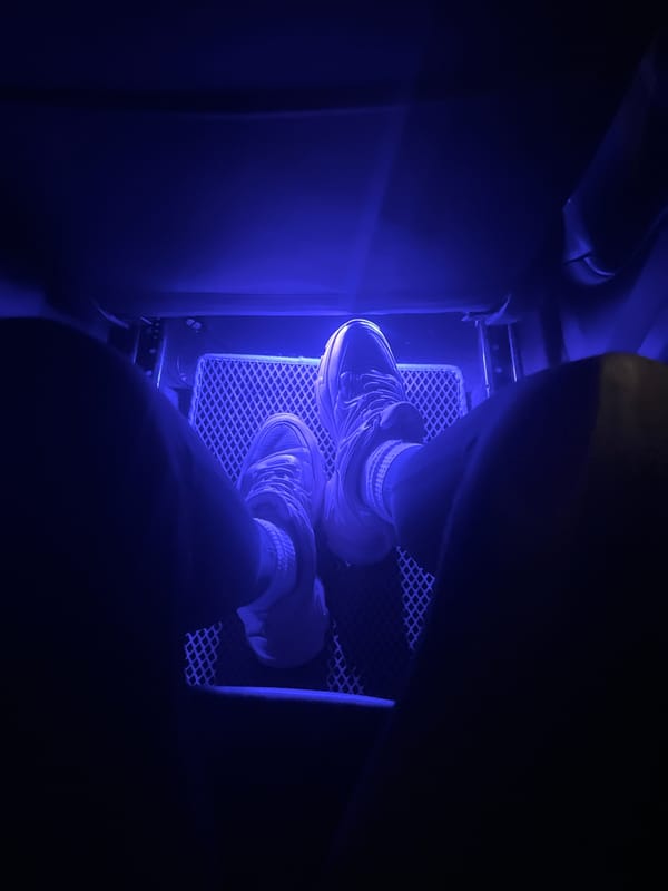 Person sits in LED-lit vehicle interior in Tyumen