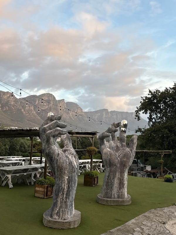Stone hand sculptures with orbs documented at Cape Town venue