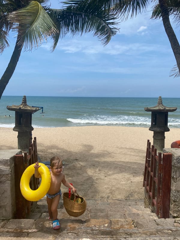 Early morning beach family time in Phu Thuy Ward Vietnam