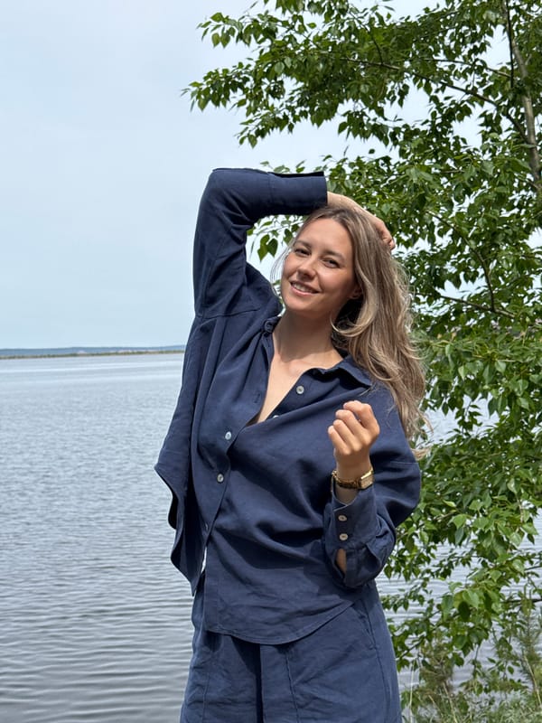 Woman photographed at waterfront locations in Chaikovsky, Russia