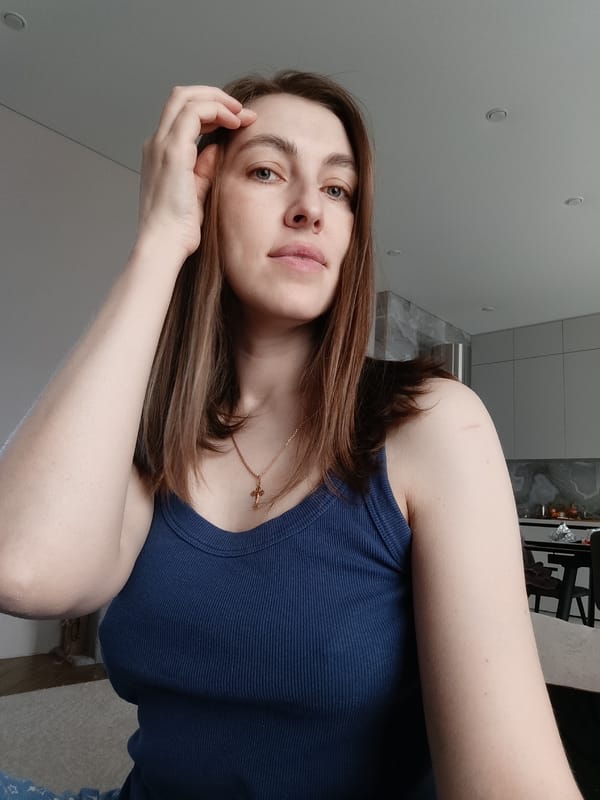 Woman Takes Morning Selfies With Cat in Chaikovsky