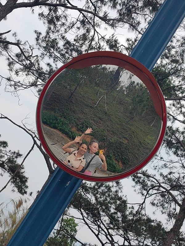 Tourist documents overcast morning scenes across Hong Gai Ward Vietnam