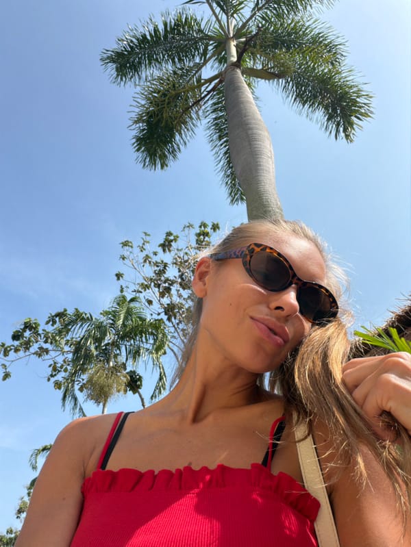 Woman poses for photos in tropical Rawai setting