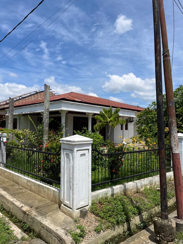 Everyday street life through a Langsa residential neighborhood