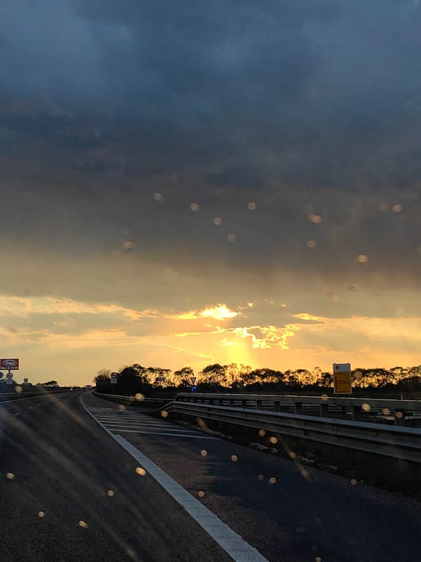 Dramatic sunset captured during highway drive in Bulgaria