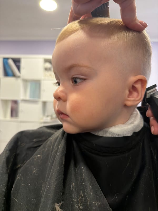 Toddler Gets First Haircut at Votkinsk Salon