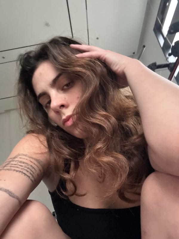 Woman documents gym workout with selfies in Givatayim