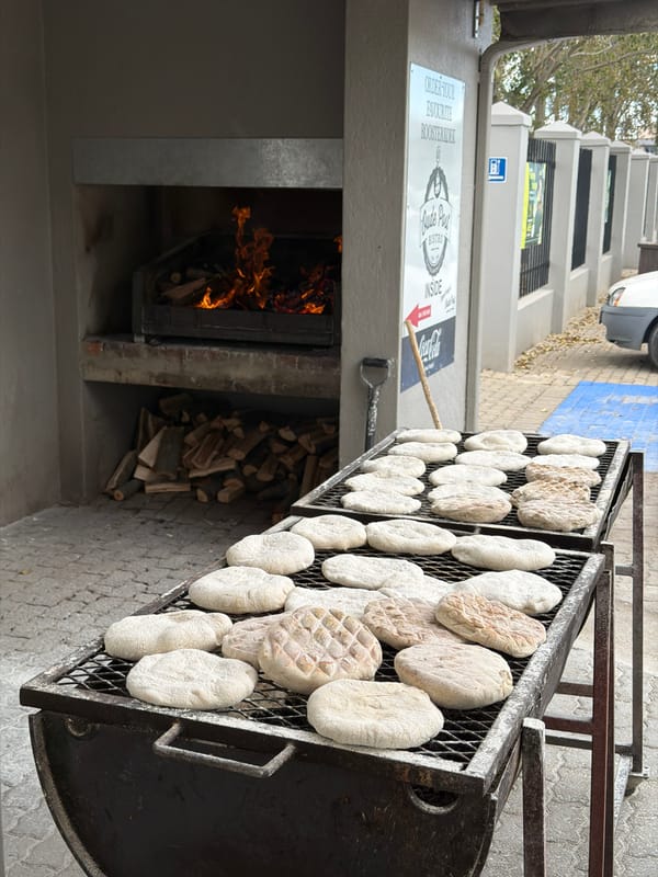 Morning scenes documented in Swellendam: cooking, socializing, vintage typewriter