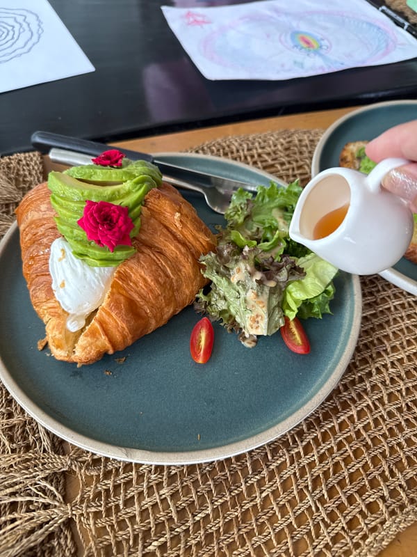 Avocado toast and croissant brunch, plated up in Baan Bo Phut