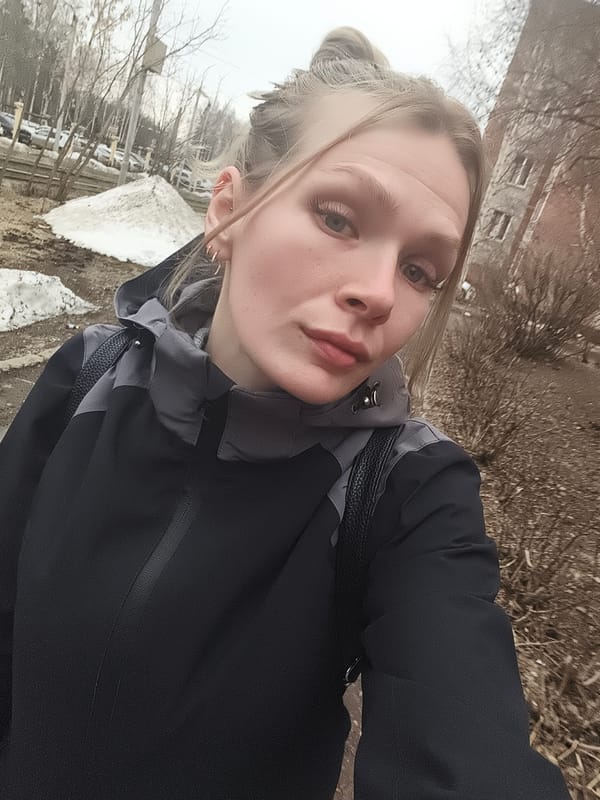 Woman takes selfie in spring weather in Izhevsk