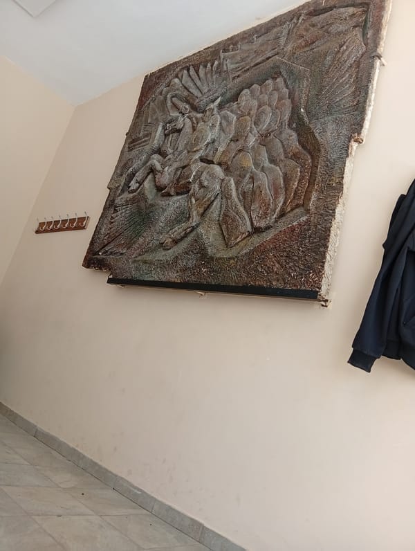 Interior scenes documented in Loznitsa showing artwork and student
