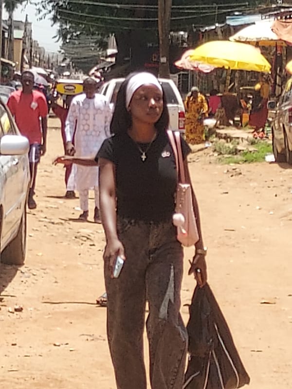 Ordinary street life documented across Jos, Nigeria neighborhoods