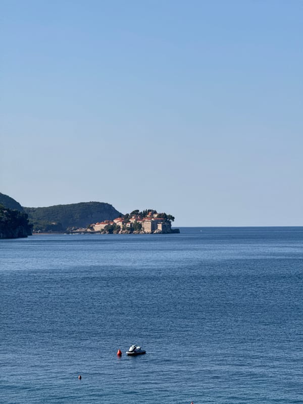 Sunny Adriatic morning at a coastal beach and cliffside venue