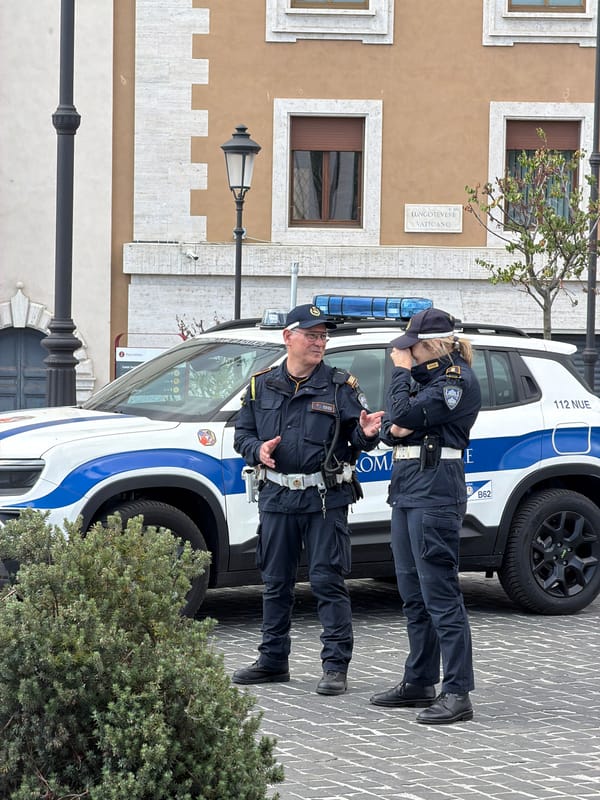 Police patrol routine street activity in Rome