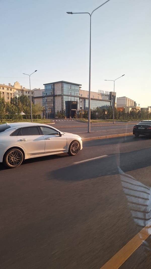 Street and transit scenes across central Astana