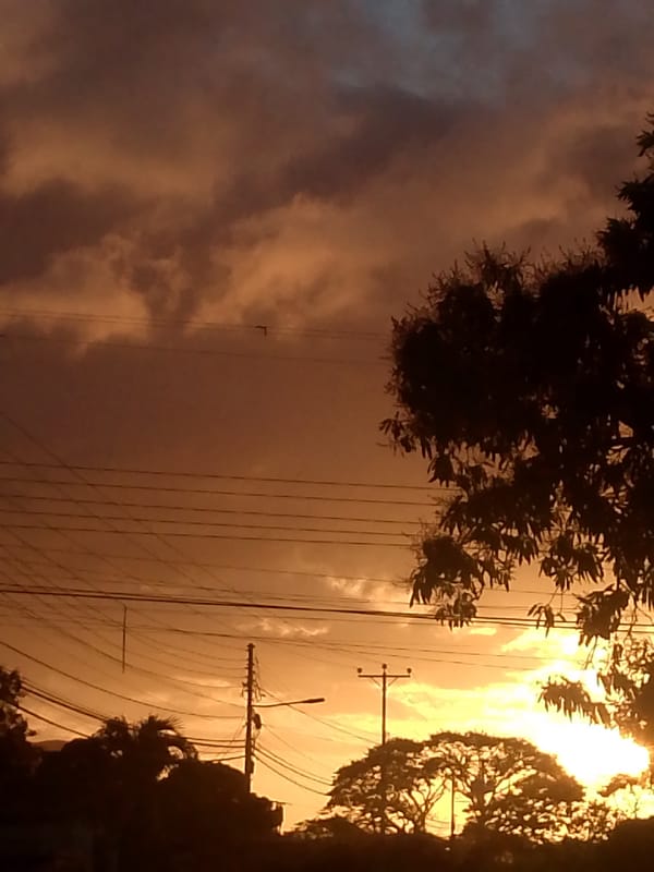 Sunset documented across Juan Griego, Venezuela neighborhood