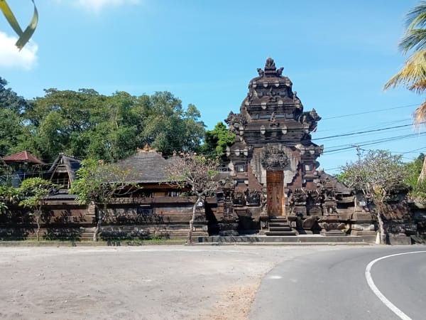 Morning documentation of ornate Balinese temple gateway and grounds