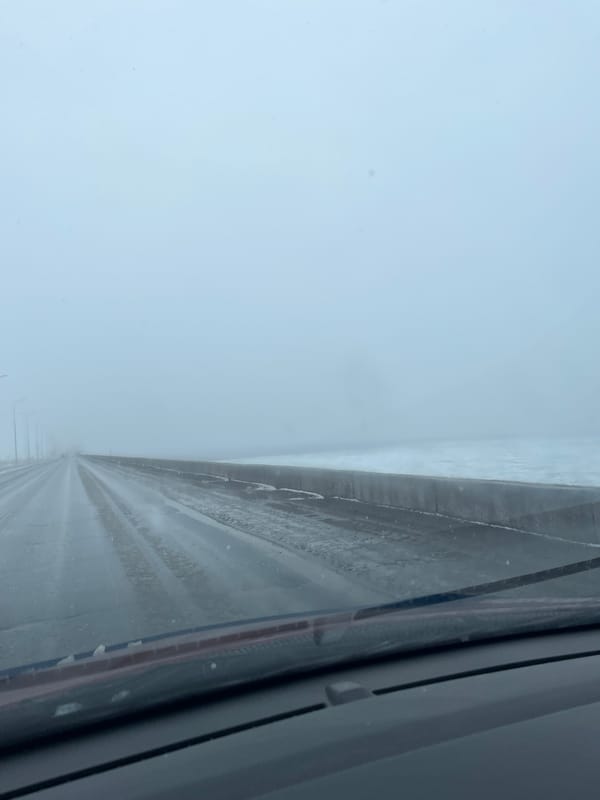 Wet road conditions documented in Chaikovsky, Russia