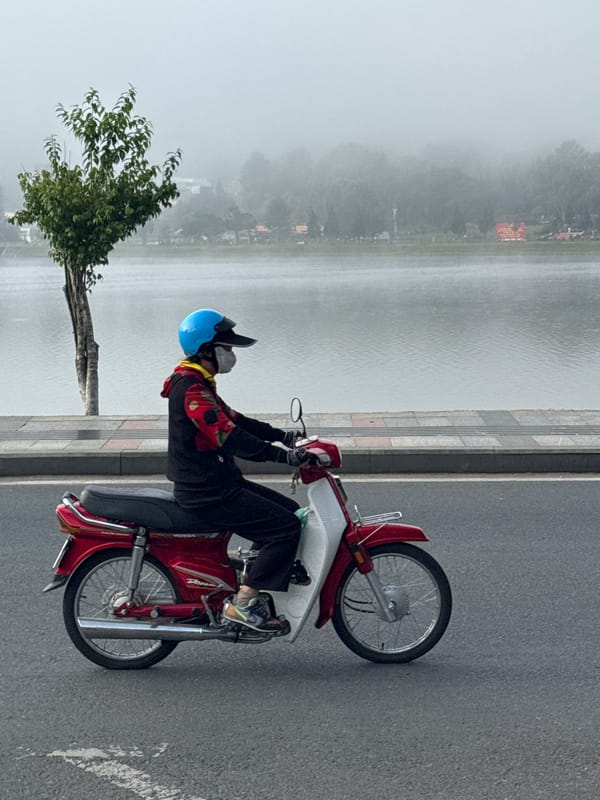 Misty morning activity along Da Lat's Xuan Huong Lake