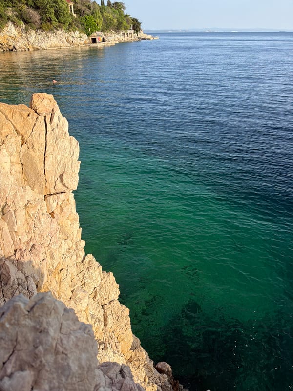 Coastal life documented in Rijeka during sunny afternoon