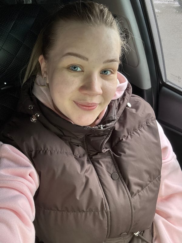 Women resting in vehicles during morning hours