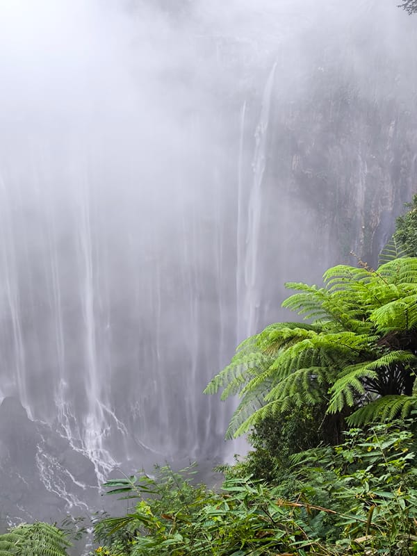 Tumpak Sewu's misty multi-stream waterfall from several angles