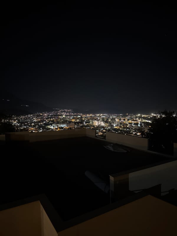 Nighttime cityscape memories captured from elevated view in Šušanj, Montenegro