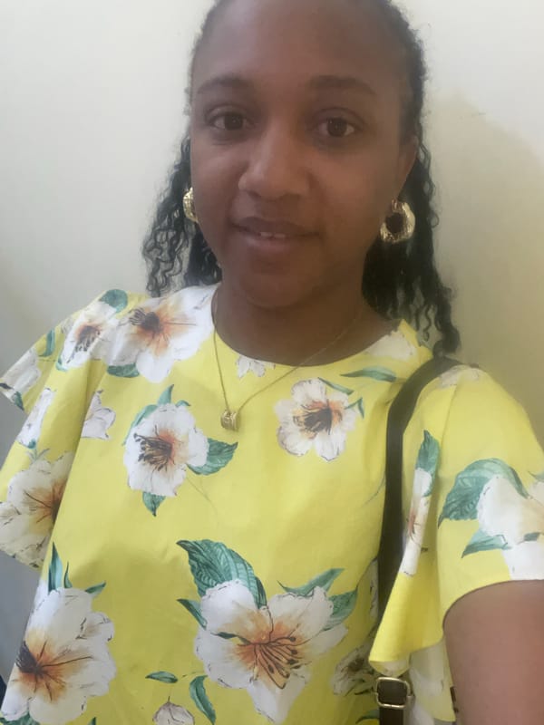 Woman in yellow floral top photographed in Jos