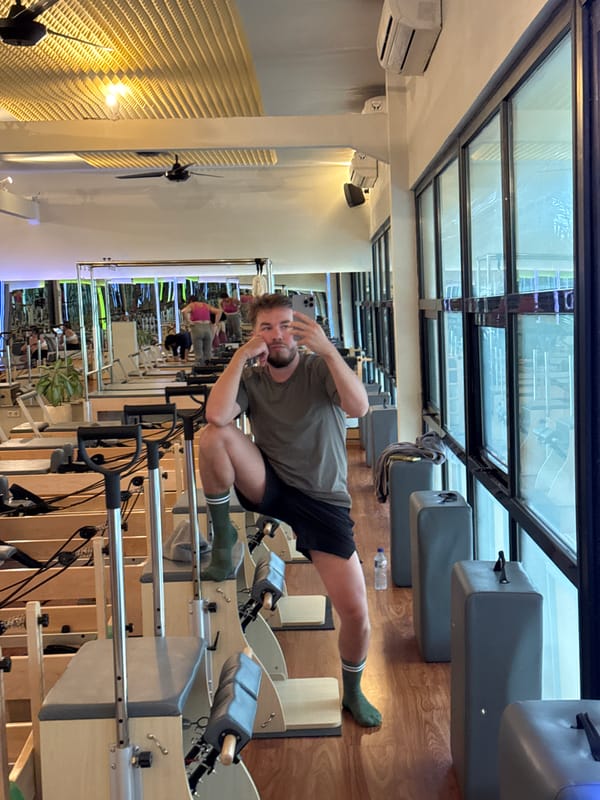 Man documents fitness session and beach art in North Kuta