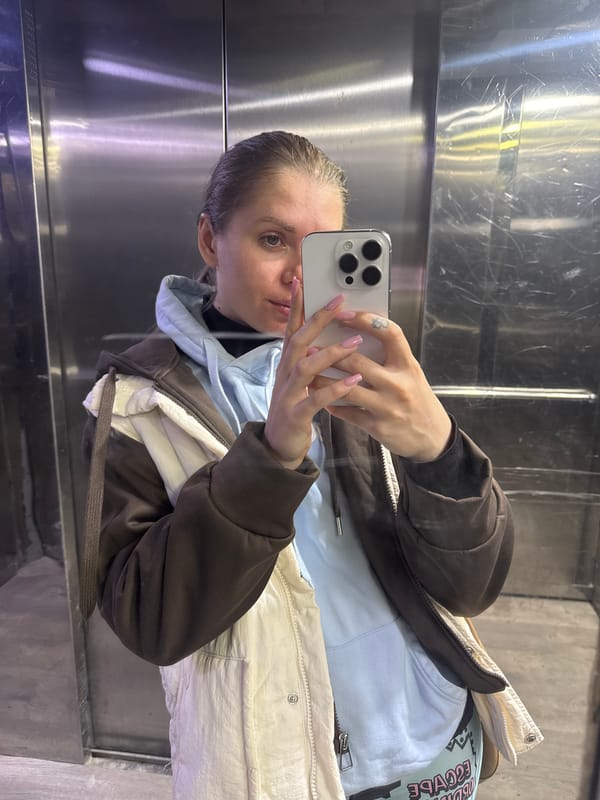 Woman takes elevator selfie in Batumi, Georgia