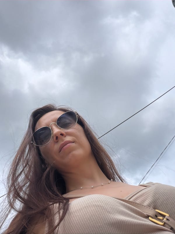 Quick low-angle portrait series on a cloudy Tujmazy street