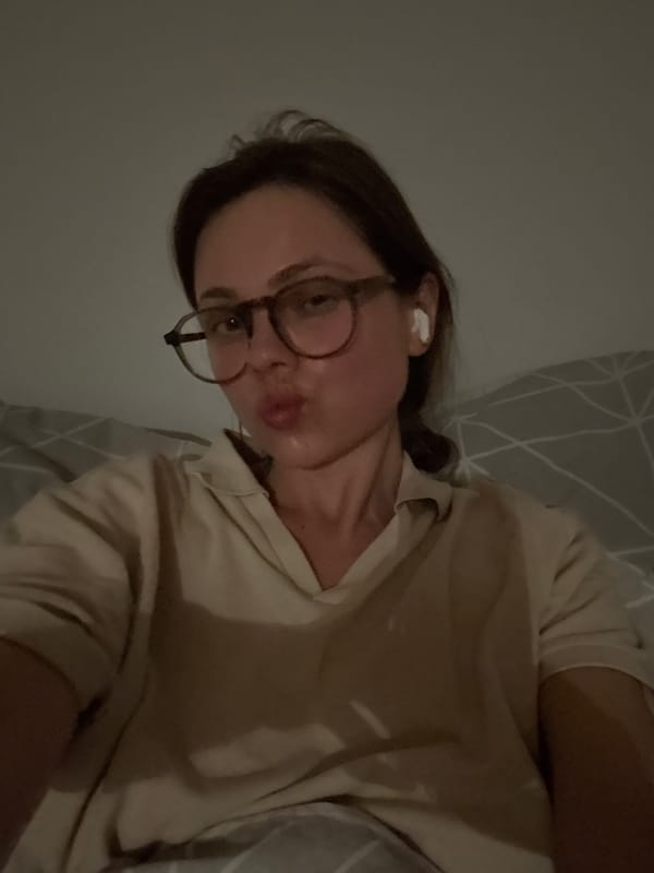 Person watches TV show on tablet in bed in Hévíz