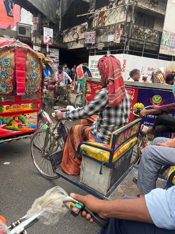 Rush hour rickshaw traffic documented in central Dhaka streets