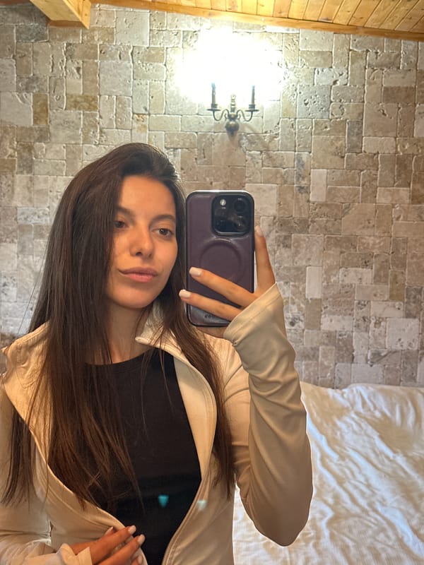 Woman takes selfie, shoes photographed in Sinemorets, Bulgaria