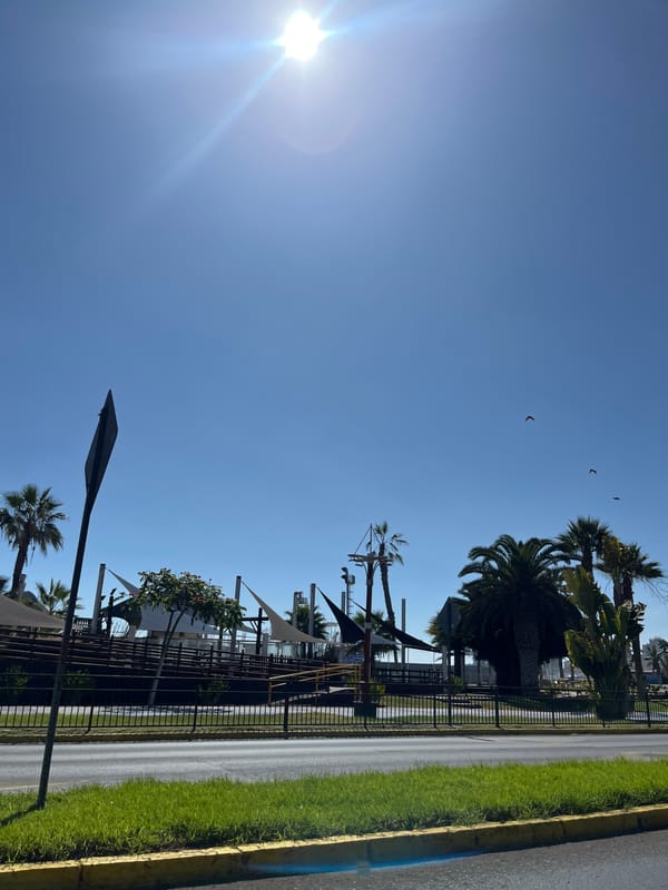 Clear skies and sunshine captured in urban outdoor scene
