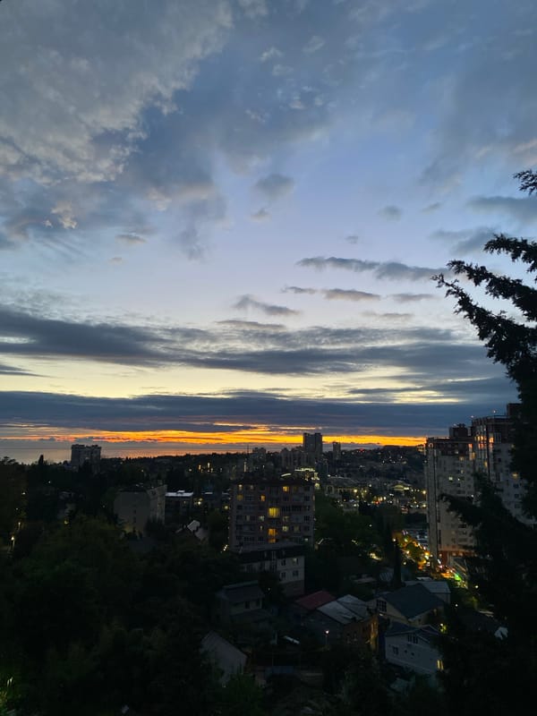 Sunset observed between buildings in Sochi, Russia