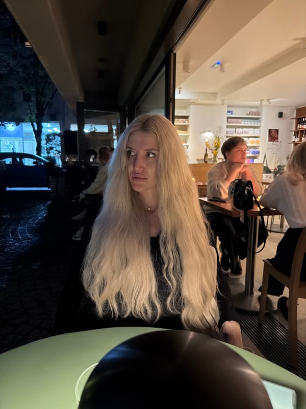 Woman dining at Belgrade restaurant captured in evening photos