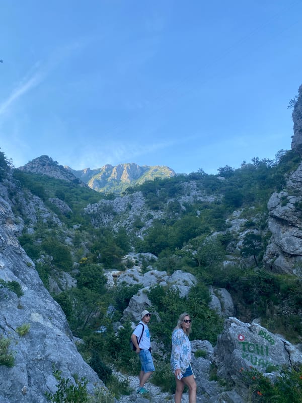 Hikers explore scenic mountain terrain in Zupci, Montenegro