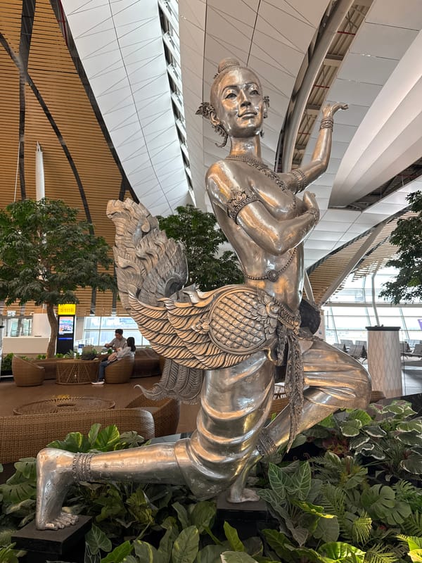 Late-night documentation of Suvarnabhumi Airport sculptures and operations