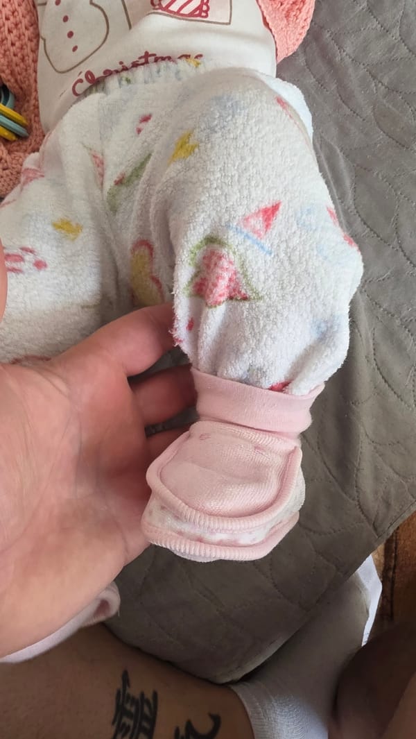 Early morning infant care moments documented in Bulgarian home