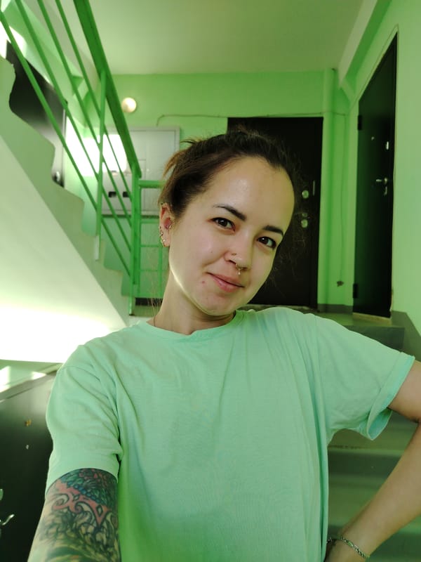 Woman photographed with dog in early morning Noviy apartment complex