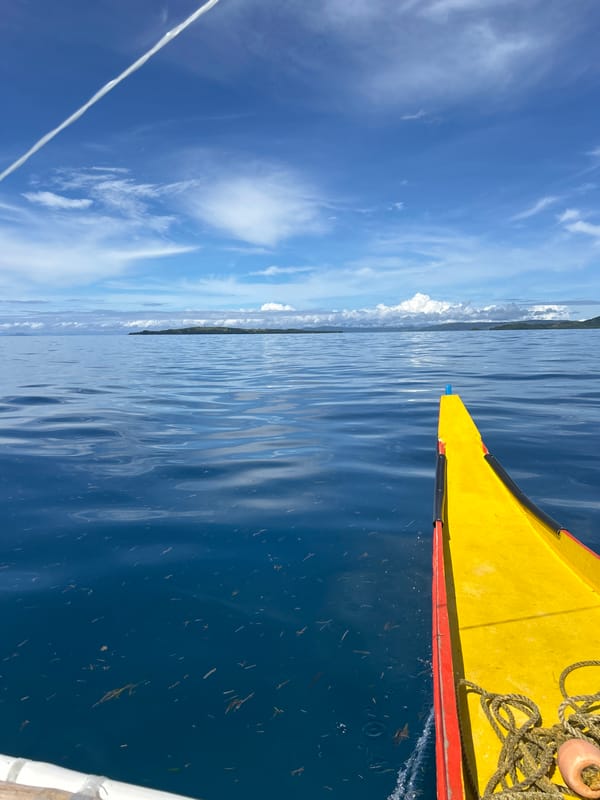 Outrigger boat journey captured near General Luna, Philippines