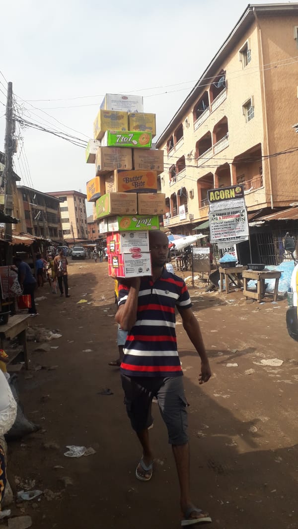 Daily market life documented across Nigerian commercial districts