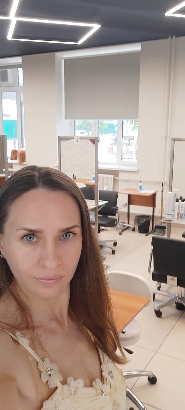 Woman takes selfies at Moscow beauty salon