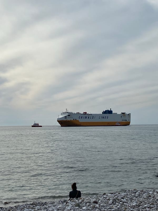 Breakdancers perform for crowd at seaside stage in Bar, Montenegro